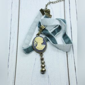Upcycled velvet ribbon necklace with a cameo and freshwater pearls.